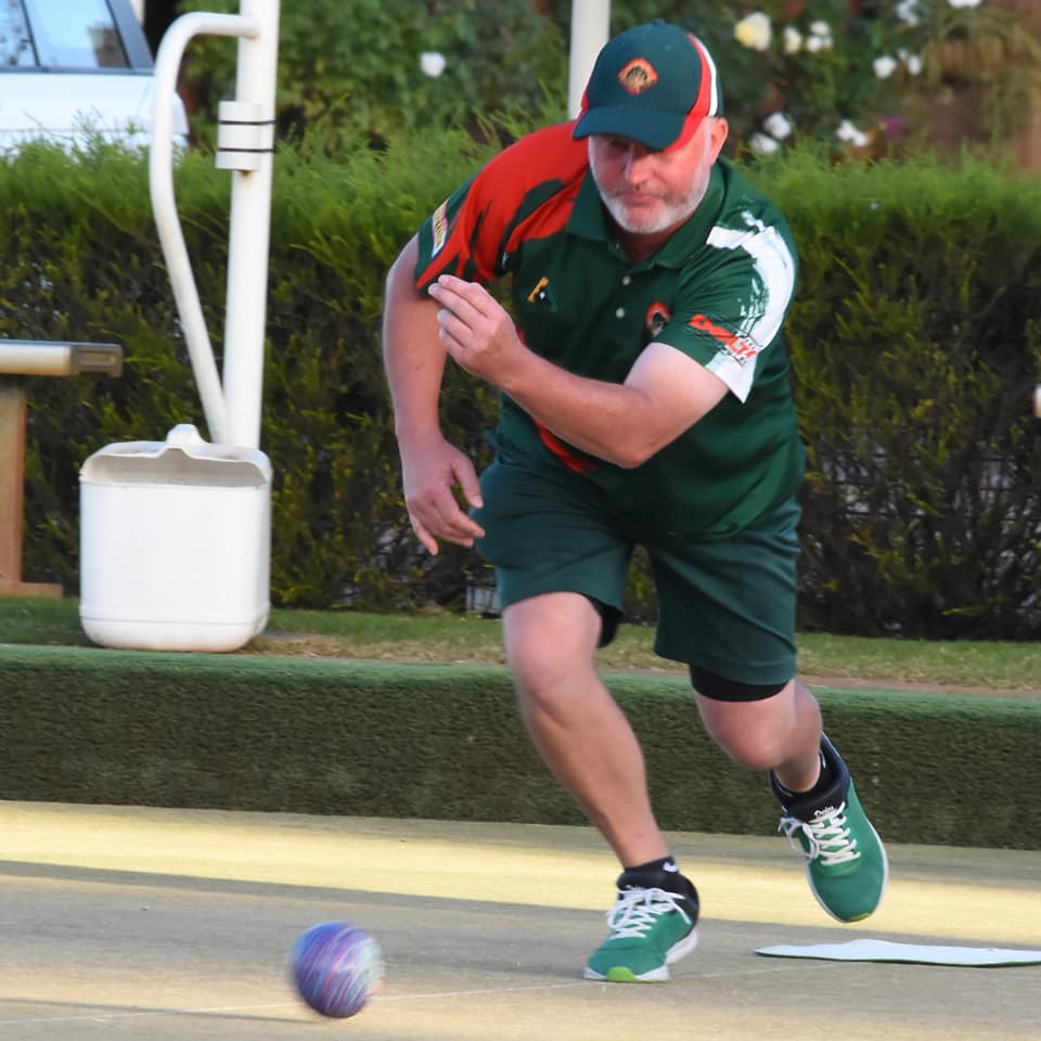 Letting it rip … Tallygaroopna’s Matt Robinson, who skipped the third placed rink, drives at the head.