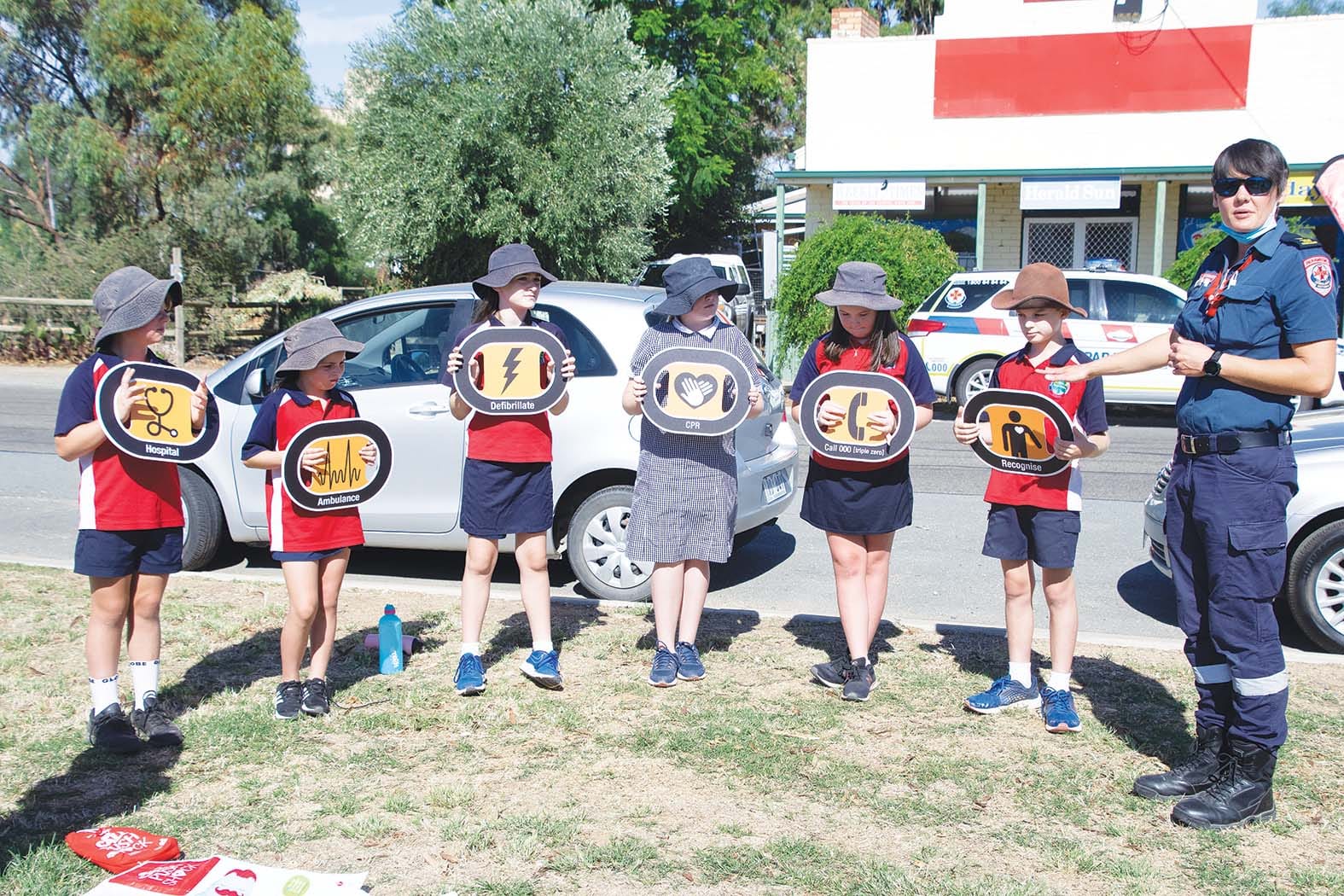 Chain of survival ... Archie Peters, Lilly Hickey, Alexis Price, Teleisha Beverley, Annabella Boschettii and Andrew Fealy helped Ambulance Victoria’s Norieul Kinross  explain the chain of  survival for cardiac arrest patients.
