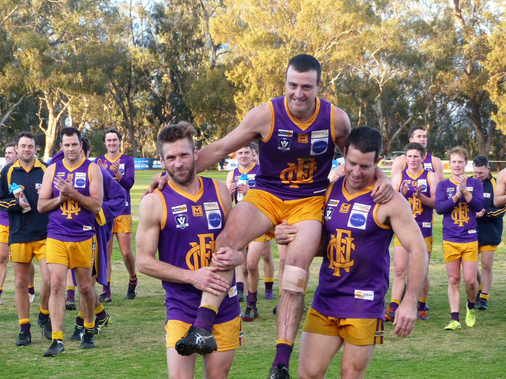 Milestone man ... Coach Mal Barnes gets chaired off in his 150th game for the club. 