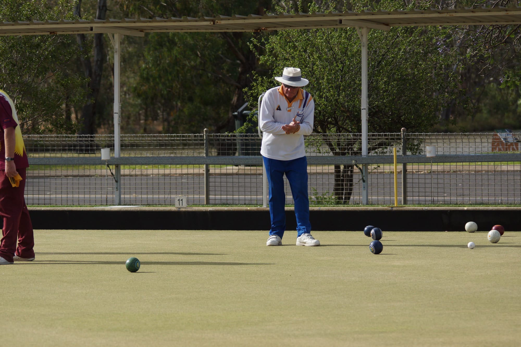 Good bowl ... Don Staggard applauds Peter Dealy’s bowl during their game against Barooga on Saturday.