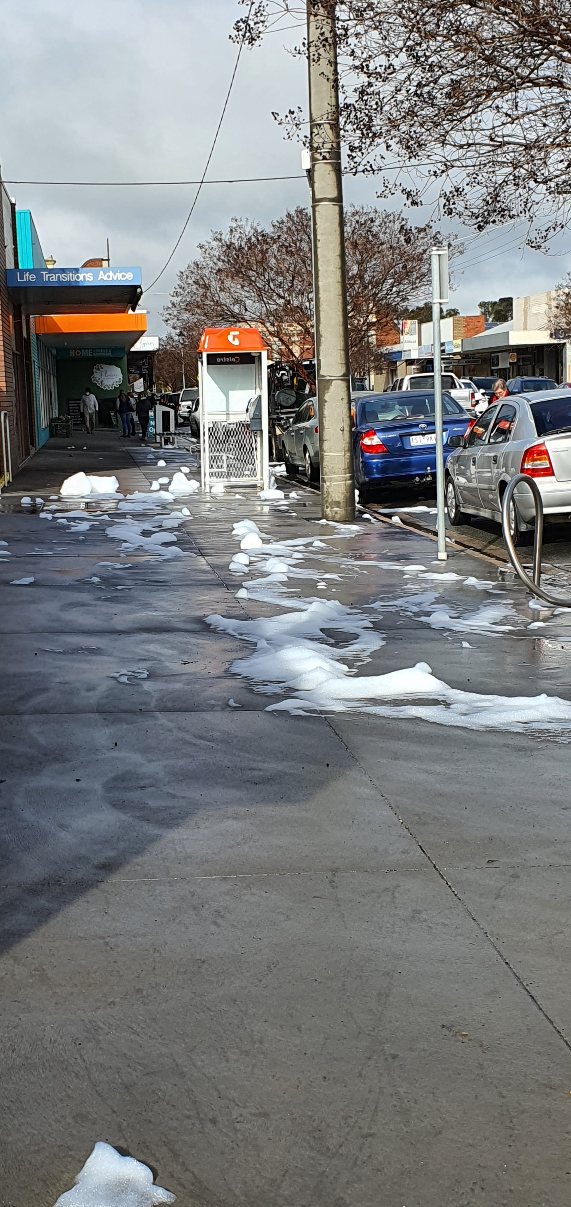 Long reach... The bubbles stretched all the way along the footpath to Home Timber & Hardware.

