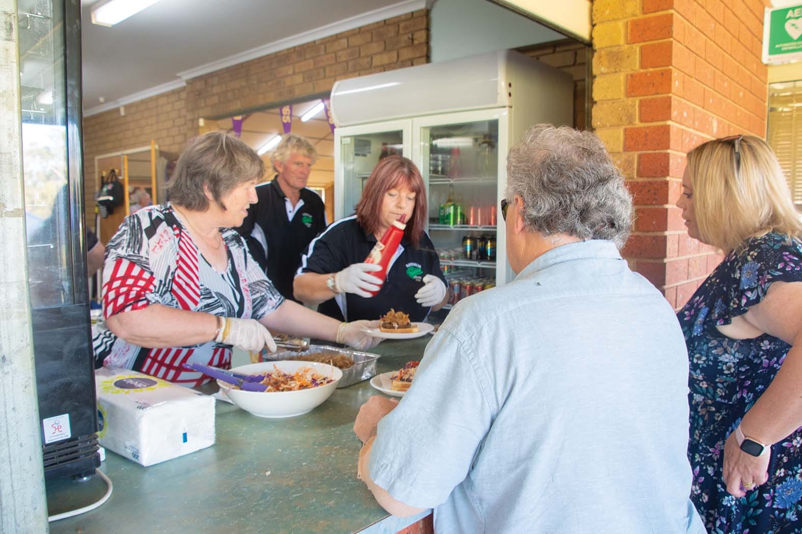Food is served ... Everyone was invited to enjoy a barbecue before the formalities got underway.
