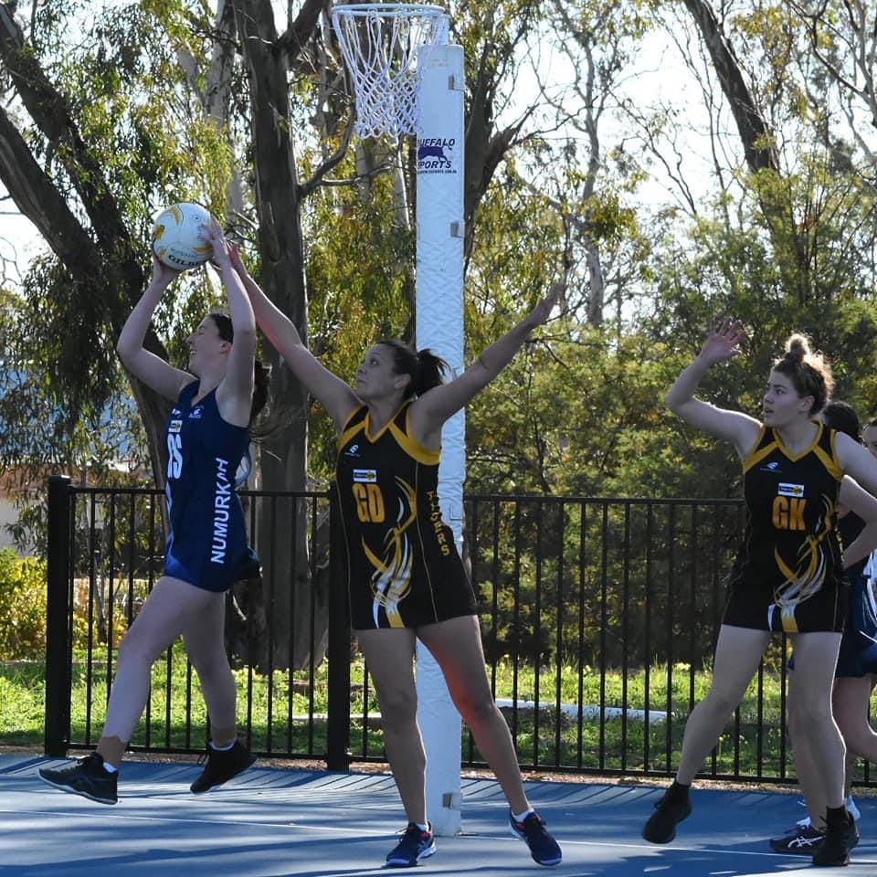 Full flight ... Teagan Bau flies for a ball in the goal ring against Cobram at the weekend.