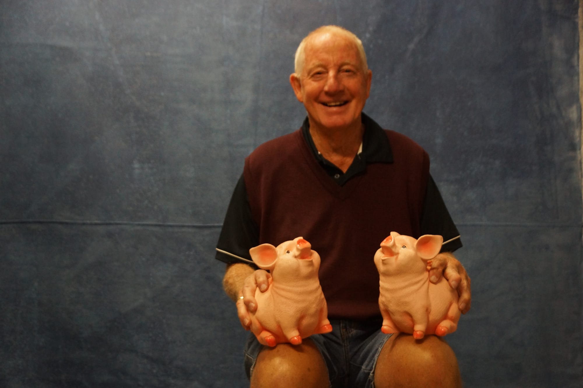 In need of names... Peter Dealy with two little pigs that need to be named. 
