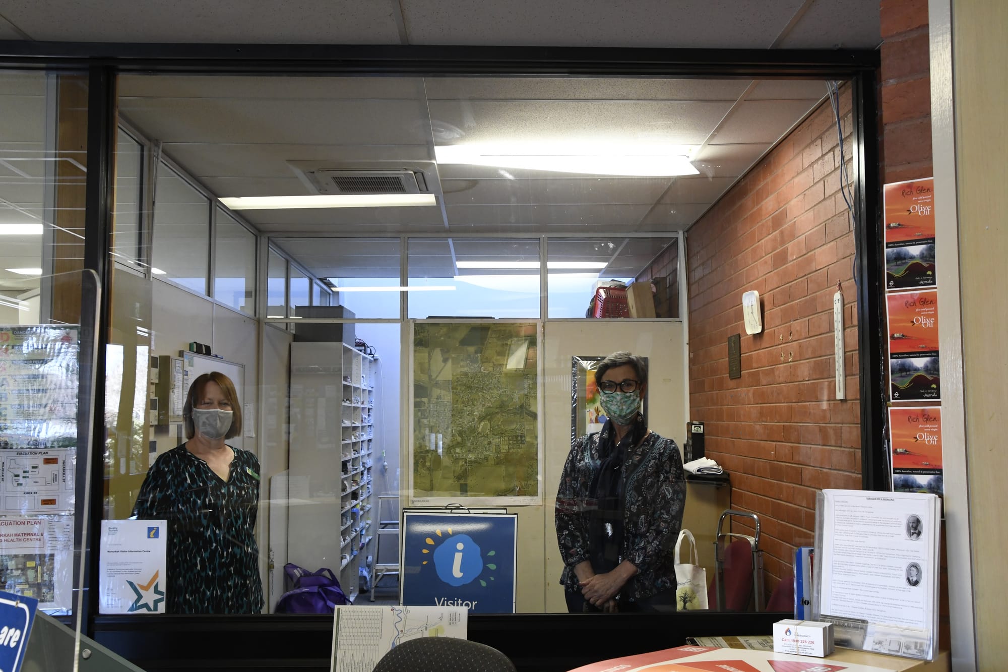 Help fill this space ... NCLC’s Janene Gittens and Deb Fowler are looking forward to this window being covered by a community quilt telling the tale of local life in lockdown. 