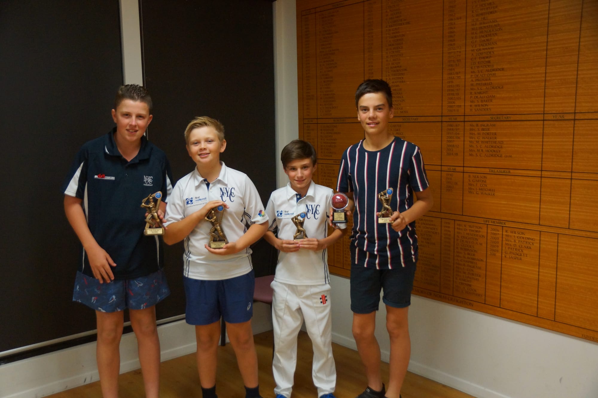 Under 12s and 14s ... Reeve Verhoeven, Kyren Dawson, Joel O’Dwyer and Matt Ward with their batting and bowling trophies.